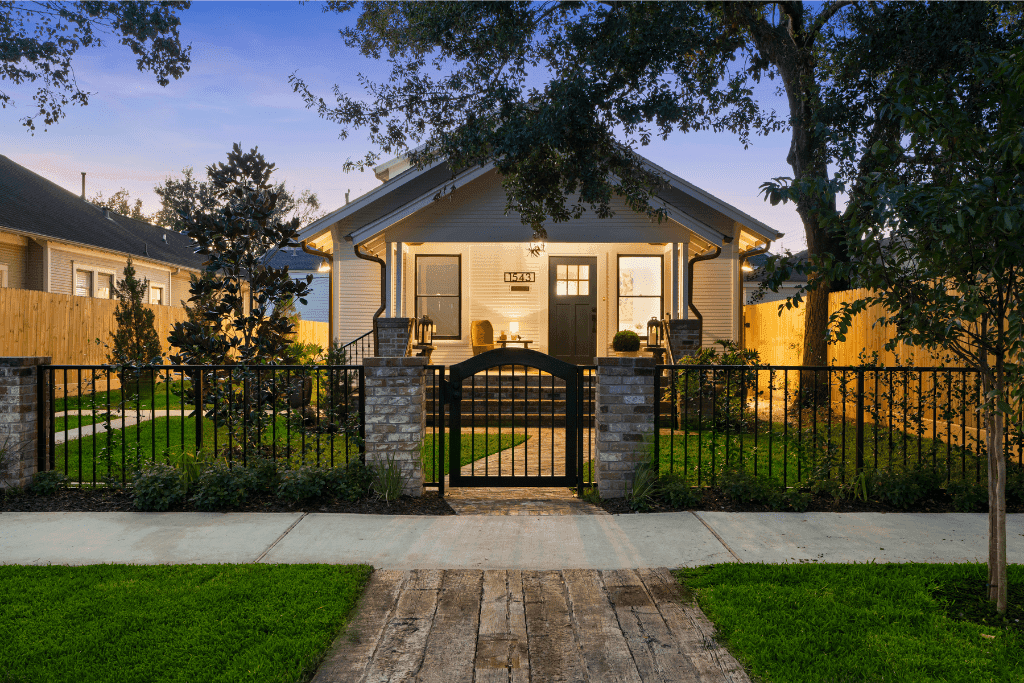 Enhanced twilight real estate exterior prepared for Houston property marketing.